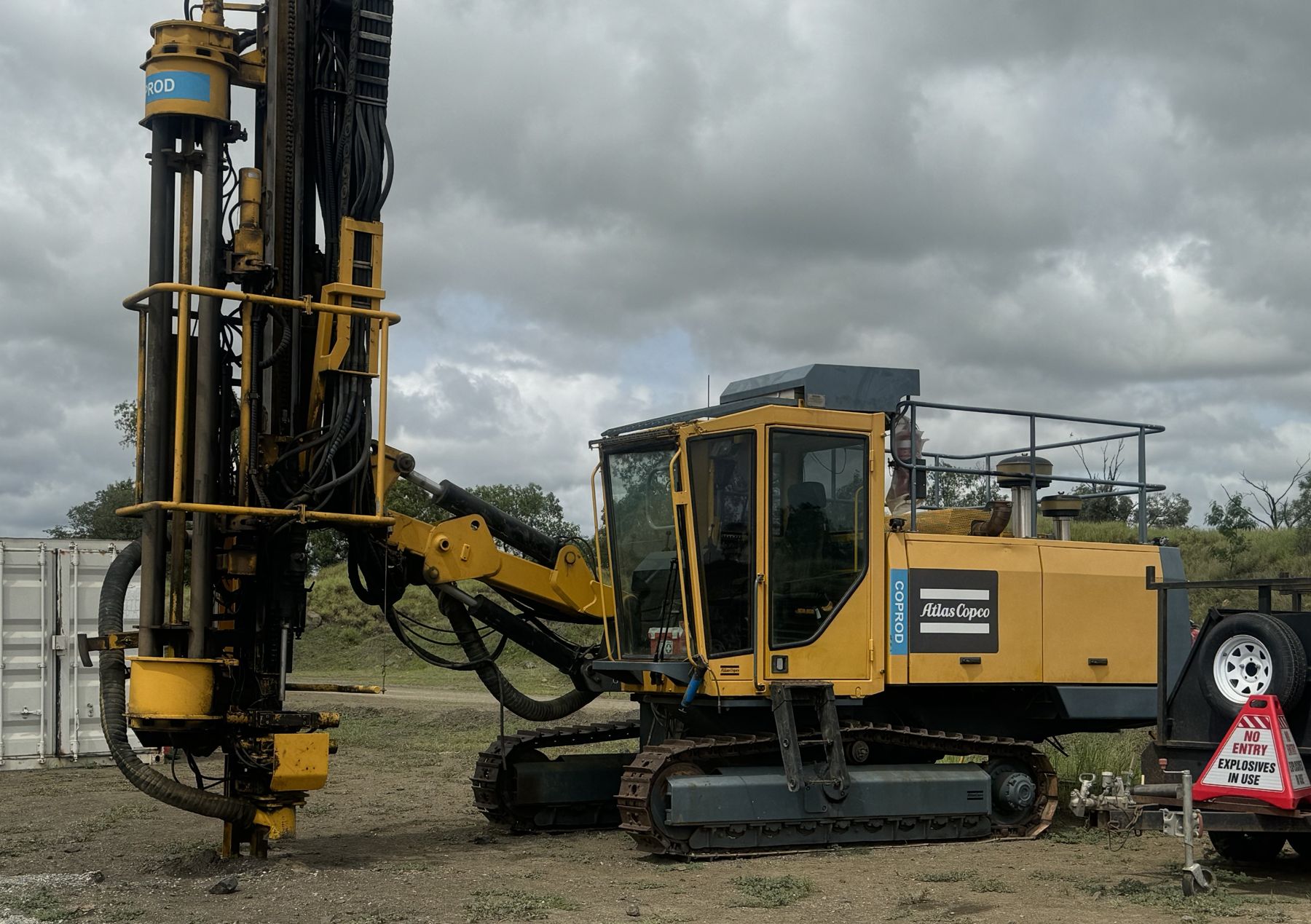 Rhinoroc top hammer drill rig on site